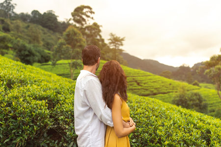 Couple of Tourists in During Excursion to Green Tea Terraces in Sri Lanka Mountainsの写真素材