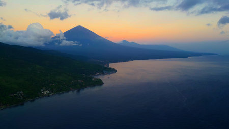 Amed Coast Sunrise With Mount Agung Volcano, Aerial Bali Seascape View At Dawnの写真素材