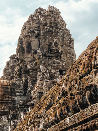 Bayon Temple Face Tower With Carved Roof Detail, Angkor Thom, Cambodiaの写真素材
