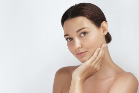 Natural Beauty Portrait Of Young Woman With Fresh Glowing Skinの写真素材