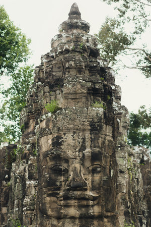 Close-Up of Stone Face Sculpture at Bayon Temple in Cambodia