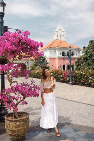 Woman By Bougainvillea At Clock Tower Plaza, Sunset Town Phu Quoc