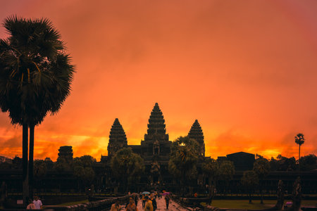 Sunrise Silhouette Of Angkor Wat Temple With Fiery Orange Sky In Cambodiaの写真素材