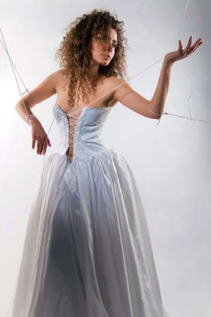 Bride tied with rope like a dollの写真素材