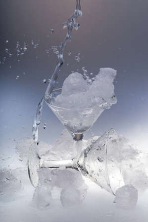 glass for alcoholic drinks and ice cubesの写真素材