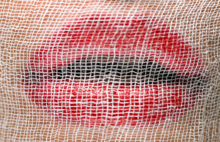 young woman's face covered by a veilの写真素材