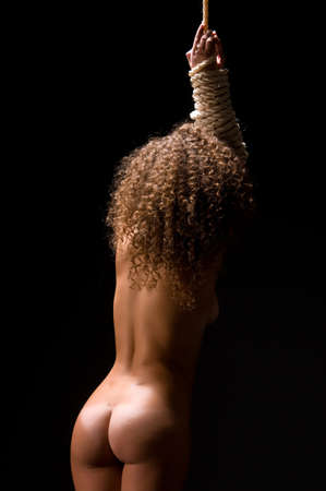 young woman with a graceful figure on the ropeの写真素材