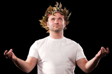bald man in a T-shirt on a black background