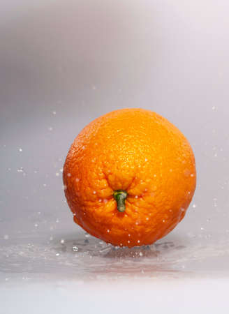 fresh oranges, which shed waterの写真素材
