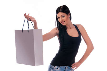 a woman in a dark blouse holding a package, isolated backgroundの写真素材