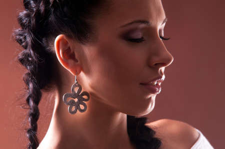 portrait of a beautiful young woman with make-upの写真素材