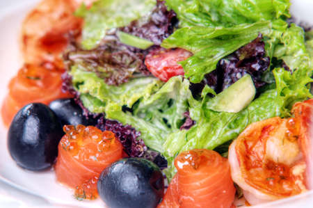 delicious sushi with red caviar and saladの写真素材