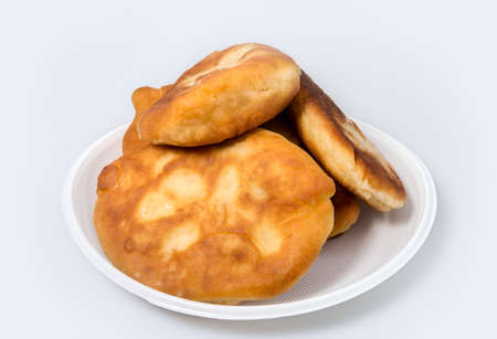 Pirojki. Traditional delicious Russian patty with potatoes and meat