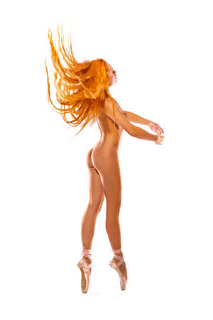 picture of dancing naked redhead over whiteの写真素材