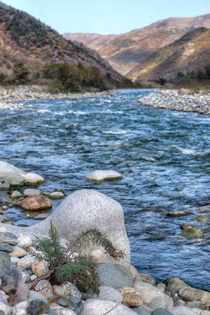autumn landscape mountain river mountains covered with colorful vegetation Russian North Caucasus
