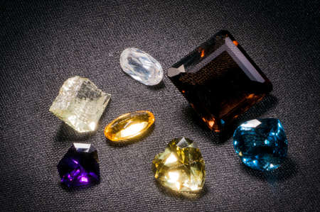 Beautiful glowing gems on a dark backgroundの写真素材