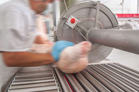 close up of meat processing in food industryの写真素材