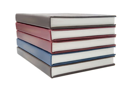 Big stack of old antique books isolated on white background