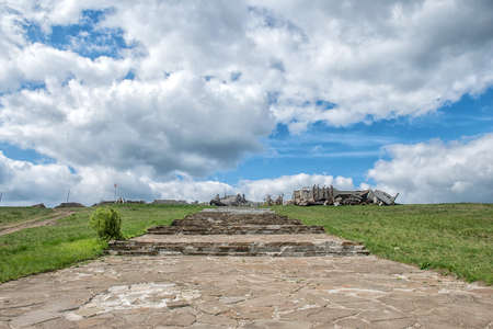 Monument to Soviet soldiers piled rubble, destroyed after the hostilities of 2014. DNR, Ukraine,...
