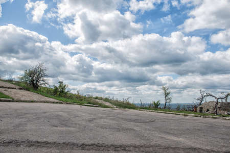 Monument to Soviet soldiers piled rubble, destroyed after the hostilities of 2014. DNR, Ukraine,...