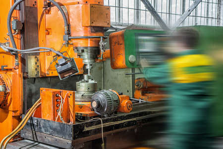 Facing operation of a metal blank on turning machine with cutting toolの写真素材