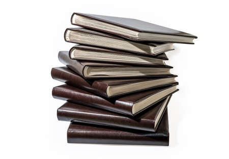 different sizes albums and books on a white backgroundの写真素材