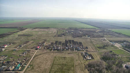 Small agrarian city with fields and streets, Stavropol Krai.の写真素材
