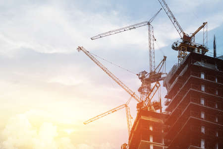Silhouettes big construction at sunset, Time off.の写真素材