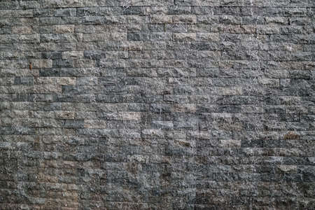 Stone wall texture for waterfalls and pattern in garden backgroundの写真素材
