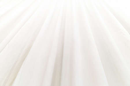 White curtain In the bedroom in the morningの写真素材