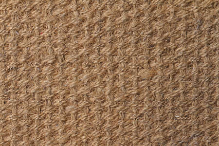 Natural fiber doormat, suitable for use as background or texture 