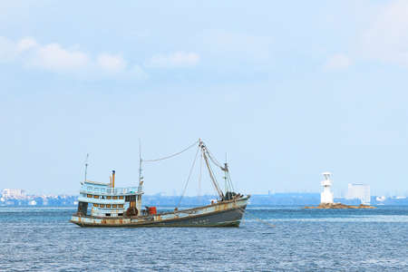 Thai fishing boat used as a vehicle for finding fish in the sea.の写真素材