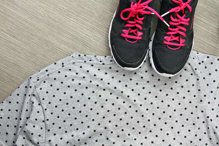 Pair of sport shoes on grey wooden background, Sport accessories and fashion, Healthy lifestyle....
