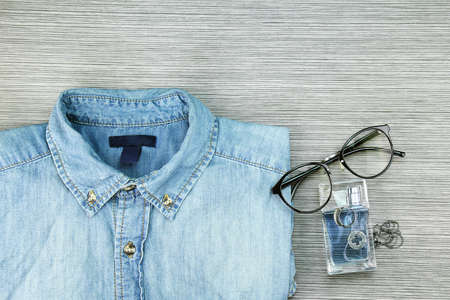 Men Fashion, Casual outfits, Blue jeans Shirt, Perfume, Necklaces, Nerd Glasses, Ring.の写真素材