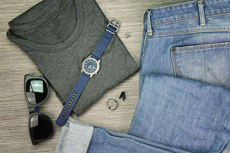 Men Fashion, Casual outfits, Set of clothes and various accessories, Trendy Hipster style outfits, Jeans, T-shirt, Necklaces, Ring, Watch, Sunglasses. (Color Process)の写真素材