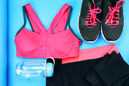 Women's sport wear, Gym fashion and accessories, Exercise Equipment, Healthy lifestyle concept, Shoes, Yoga Mat, Sport Bra, Bottle. (Color Processed)の写真素材