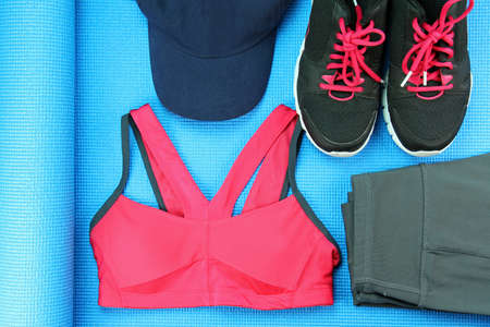 Women's sport wear, Gym fashion and accessories, Exercise Equipment, Healthy lifestyle concept, Shoes, Yoga Mat, Sport Bra.の写真素材