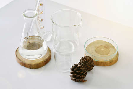 Group of laboratory glassware with natural ingredient for beauty products.の写真素材