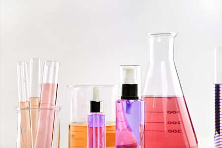 Scientific laboratory experimental glassware with clear solution, Symbolic of science research and development.の写真素材