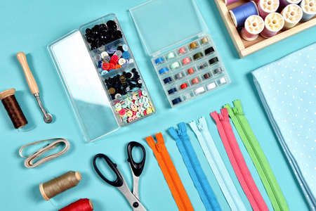 Pastel color background, Dressmaker and designer desk, Handcraft accessories, Threads roll,...