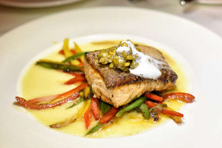 Healthy food menu, Grilled sea bass fish with steamed vegetable.