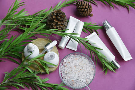 Cosmetic bottle containers packaging with green herbal leaves, Blank label for organic branding...