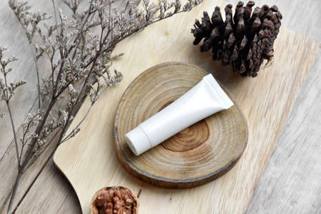 Cosmetic bottle containers packaging with winter seasonal theme, Blank label for organic branding mock-up, Natural skincare beauty product concept.の写真素材