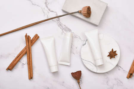 Cosmetic bottle containers on marble background, Blank label package for branding mock-up, Natural organic beauty product concept, Research and development of purified botany skincare.の写真素材