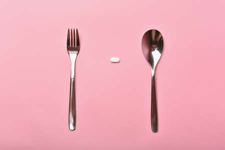 Pharmaceutical medicine, Medication pills and spoon, Overdiagnosis drugs cause bad health.の写真素材