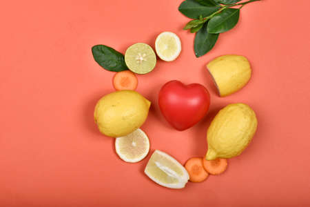 Heart model with fresh fruit and vegetable, Healthy diet, Vitamin and mineral supplement, Nutrition food as a prescription for good health.の写真素材