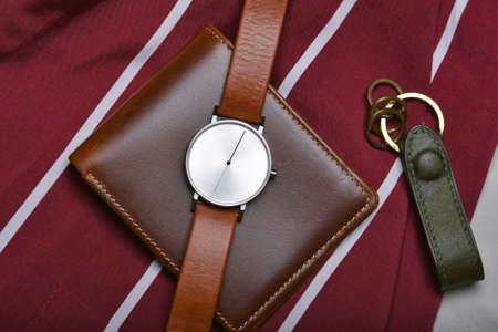 Men fashion and accessories, Wrist watch with brown leather strap, Stylish men stuff, Fashion watch with wallet and belt.の写真素材