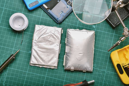 Smart phone repair, Broken battery replacement, Lithium polymer battery swollen dangerous to explode...