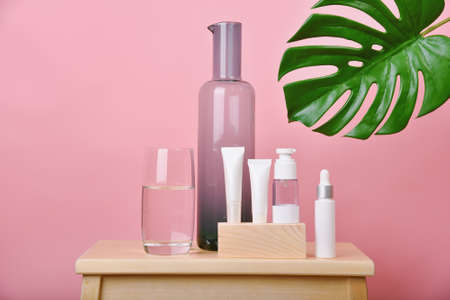 Cosmetic bottle containers and crystal clear glassware, Minimal natural hydration skincare concept, Purity cosmeceutical beauty care.の写真素材