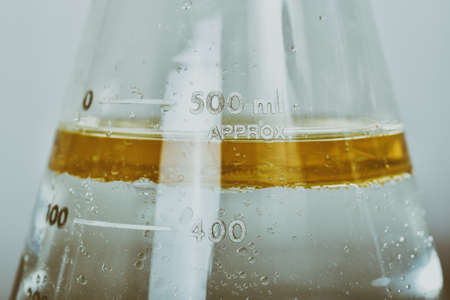 Oil in water emulsions, Oil mixing in liquid phase, Science laboratory, Chemical substance in cylinder, Medical formulating and cosmetic research.の写真素材